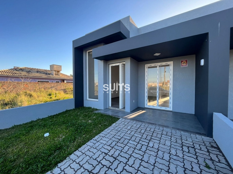 Excelente geminado em obra no centro de Xangri-Lá: 1ª foto da galeria de imagens do imóvel