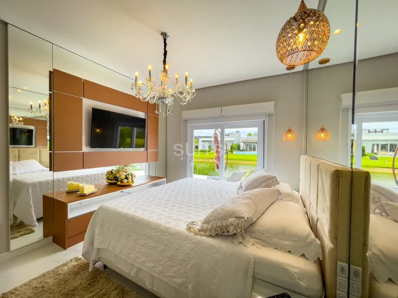 Casa mobiliada e decorada na beira do lago no condomínio Riviera: 42ª foto da galeria de imagens do imóvel