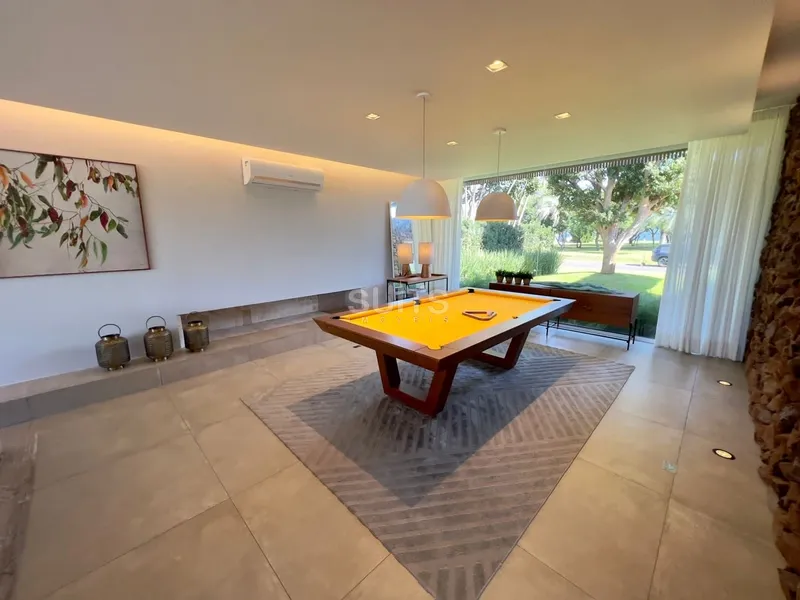 Espetacular mansão beira lago no condomínio Bosques de Atlântida: 6ª foto da galeria de imagens do imóvel