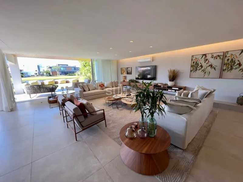 Espetacular mansão beira lago no condomínio Bosques de Atlântida: 4ª foto da galeria de imagens do imóvel