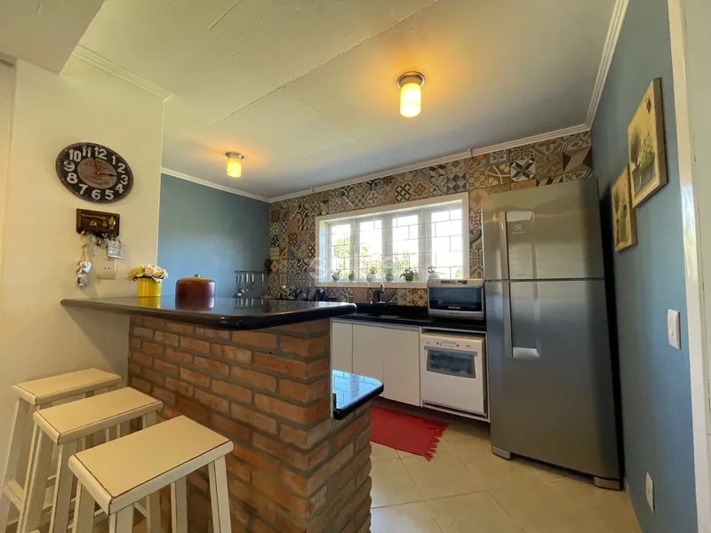 Excelente casa no centro de Atlântida: 12ª foto da galeria de imagens do imóvel