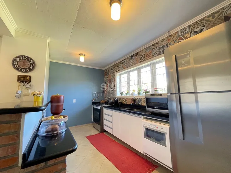 Excelente casa no centro de Atlântida: 13ª foto da galeria de imagens do imóvel