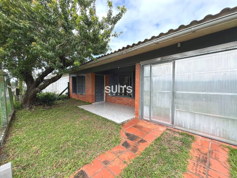 Excelente casa com dois terrenos no centro de Xangri-lá.: 1ª foto da galeria de imagens do imóvel