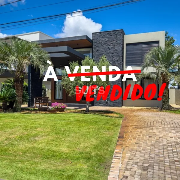 Excelente sobrado beira lago no condomínio Enseada: 1ª foto da galeria de imagens do imóvel