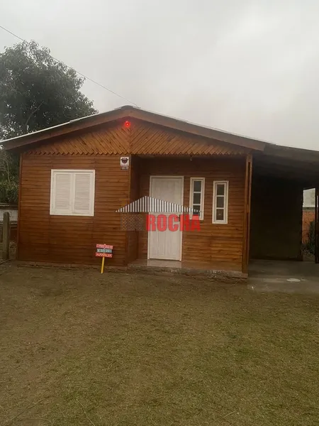 EXCLUSIVO! CASA DE MADEIRA EM PRAIA DE ARROIO TEIXEIRA!: 3ª foto da galeria de imagens do imóvel