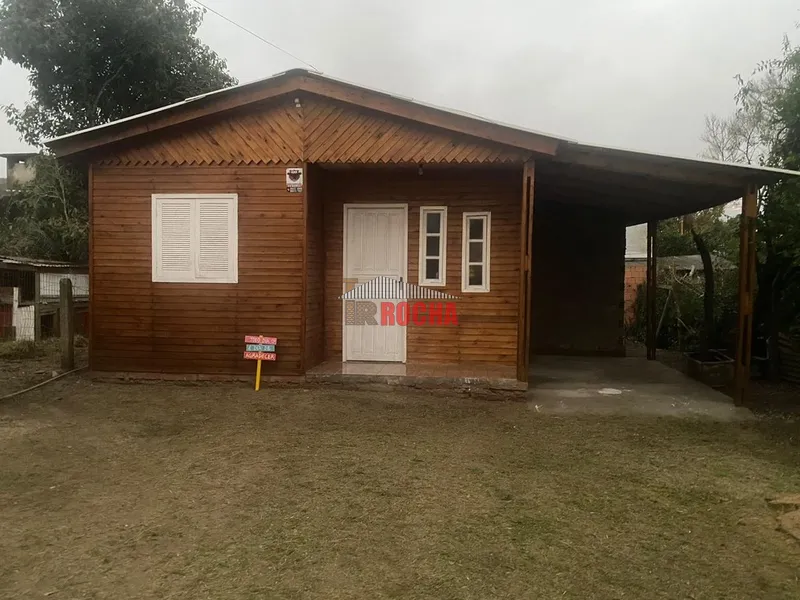 EXCLUSIVO! CASA DE MADEIRA EM PRAIA DE ARROIO TEIXEIRA!: 1ª foto da galeria de imagens do imóvel