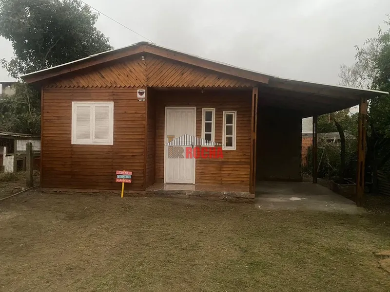 EXCLUSIVO! CASA DE MADEIRA EM PRAIA DE ARROIO TEIXEIRA!: 2ª foto da galeria de imagens do imóvel