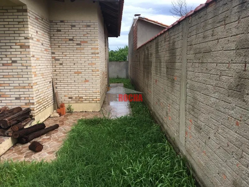 CASA COM AMPLO PÁTIO EM PRAIA DE ARROIO TEIXEIRA!: 4ª foto da galeria de imagens do imóvel