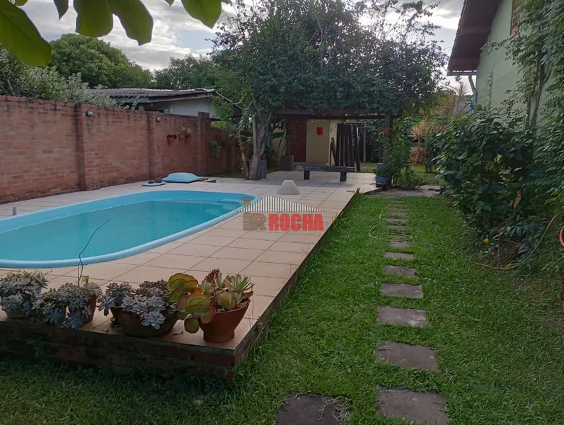 CASA COM PISCINA E DOIS TERRENOS!!: 6ª foto da galeria de imagens do imóvel