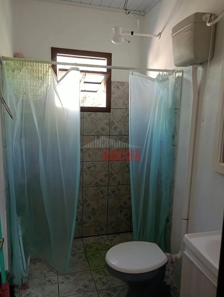 CASA COM AMPLO PÁTIO EM PRAIA ARROIO TEIXEIRA!: 11ª foto da galeria de imagens do imóvel