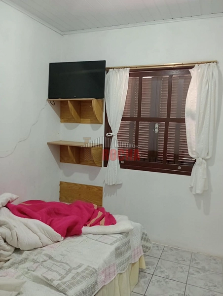 CASA COM AMPLO PÁTIO EM PRAIA ARROIO TEIXEIRA!: 10ª foto da galeria de imagens do imóvel