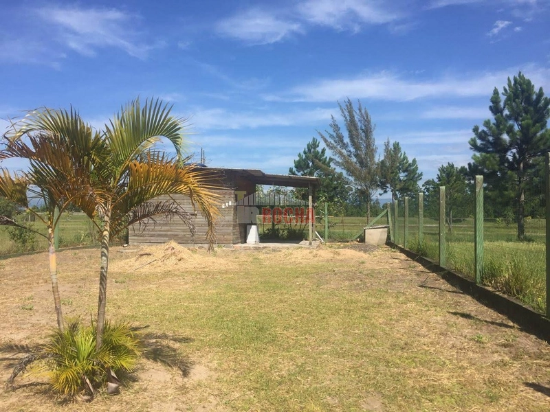 CASA COM AMPLO TERRENO EM PRAIA ARROIO TEIXEIRA!: 3ª foto da galeria de imagens do imóvel