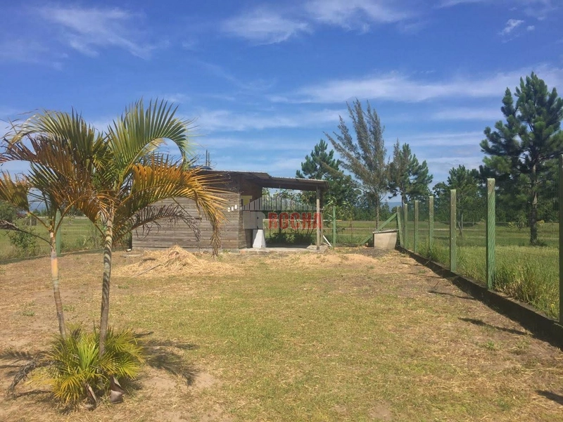 CASA COM AMPLO TERRENO EM PRAIA ARROIO TEIXEIRA!: 2ª foto da galeria de imagens do imóvel