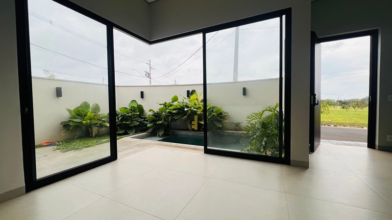 Casa Nova à Venda no Condomínio Barcelona 2 | 3 Suítes com Jardim de Inverno, Pé Direito Duplo e Piscina – Araçatuba: 6ª foto da galeria de imagens do imóvel