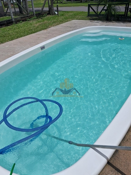 Ótima casa em Arroio do Sal pertinho do mar.: 8ª foto da galeria de imagens do imóvel