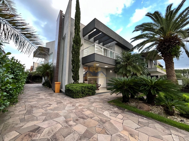 Ótima casa localizada no condomínio Velas da Marina em Capão da Canoa: 2ª foto da galeria de imagens do imóvel