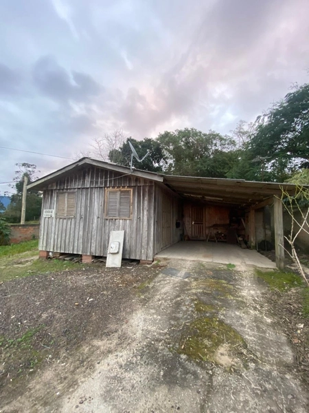 TERRENO COM CASA À VENDA EM TERRA DE AREIA: 3ª foto da galeria de imagens do imóvel