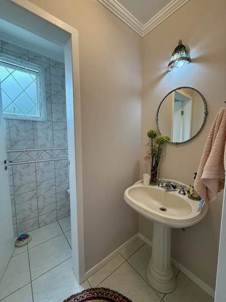 Casa de 295m² com 3 suítes em Cacupé em condomínio fechado: 13ª foto da galeria de imagens do imóvel