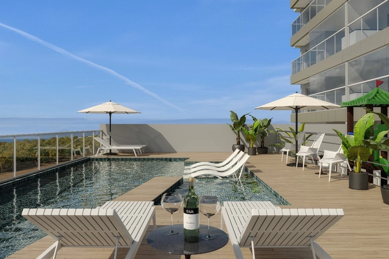 APARTAMENTO LATERAL EM EDIFÍCIO FRENTE MAR NA PRAIA CENTRAL: 2ª foto da galeria de imagens do imóvel