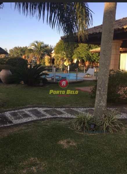 CASA À VENDA COM ESPAÇO AMPLO E ÁREA VERDE: 4ª foto da galeria de imagens do imóvel