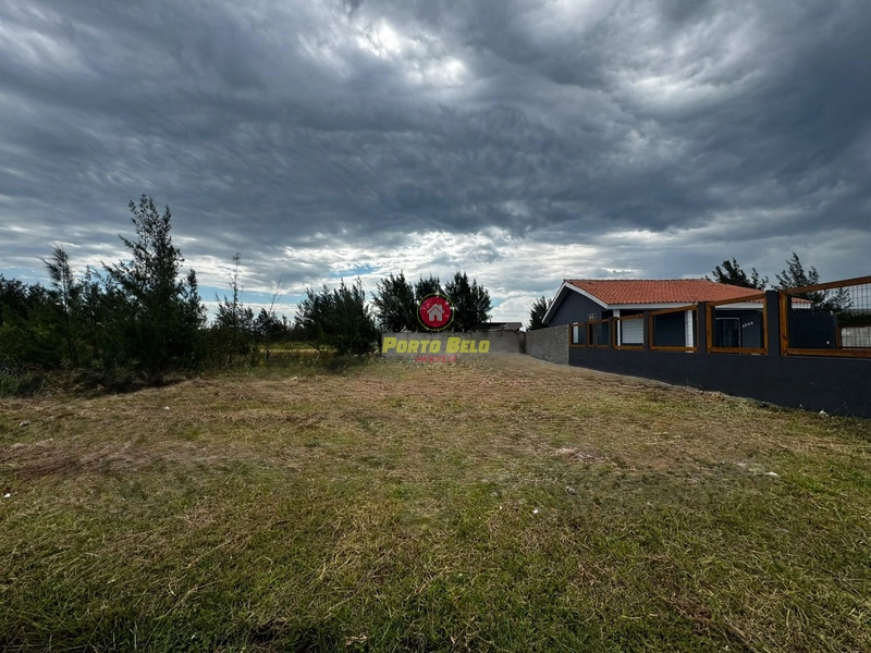TERRENO AO LADO DO CONDOMÍNIO EM ATLÂNTIDA SUL: 1ª foto da galeria de imagens do imóvel