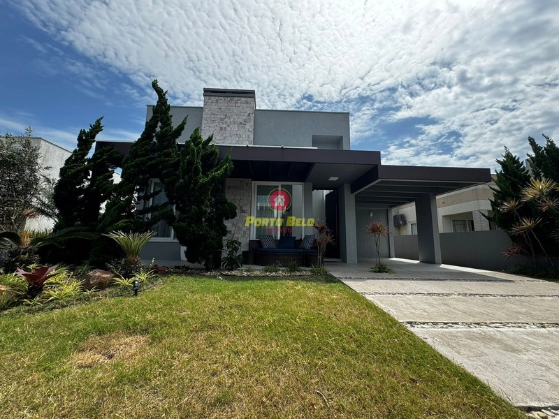CASA EM CONDOMÍNIO FECHADO EM ATLANTIDA SUL: 1ª foto da galeria de imagens do imóvel