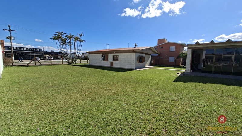 CASA EM AVENIDA EM AMPLO LOTE: 2ª foto da galeria de imagens do imóvel