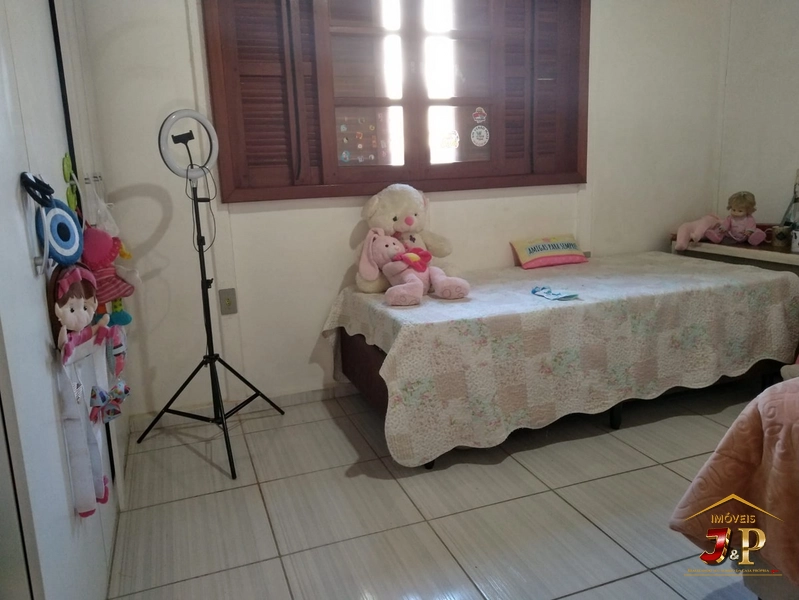Casa aconchegante, com 2 dormitórios e grande terreno: 12ª foto da galeria de imagens do imóvel