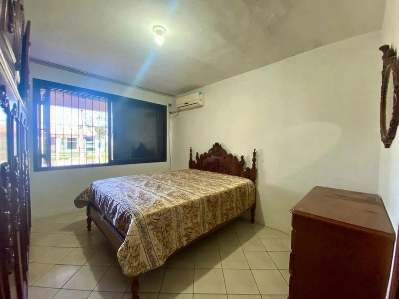 Casa com 3 dormitórios a 2 quadras do mar: 3ª foto da galeria de imagens do imóvel