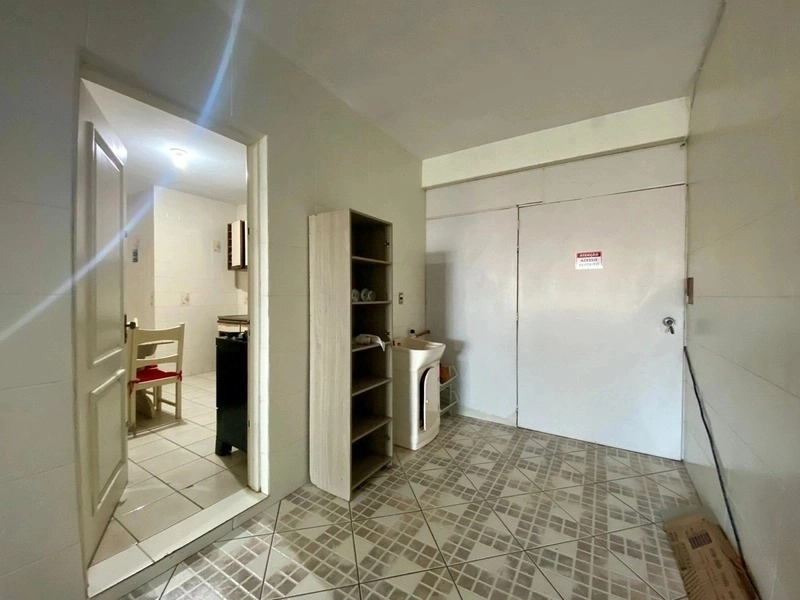 Casa com 3 dormitórios a 2 quadras do mar: 7ª foto da galeria de imagens do imóvel