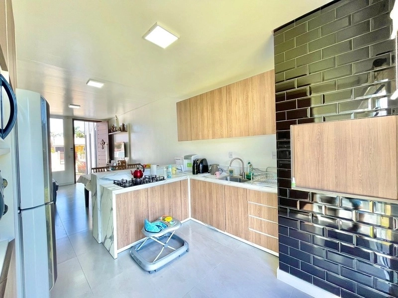 Casa 2 dormitórios próxima a praia: 4ª foto da galeria de imagens do imóvel