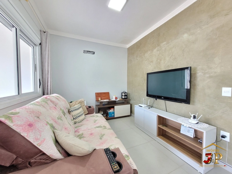 Casa com 2 dormitórios a alguns passos do mar: 4ª foto da galeria de imagens do imóvel
