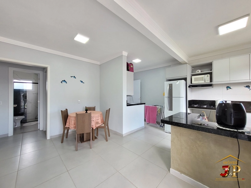 Casa com 2 dormitórios a alguns passos do mar: 3ª foto da galeria de imagens do imóvel