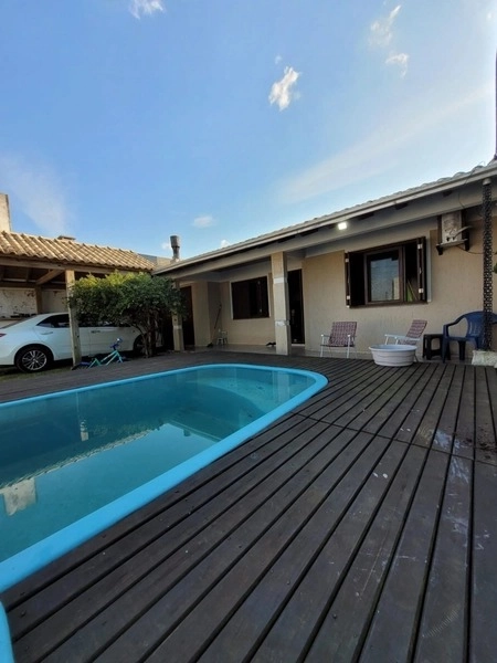 EXCELENTE CASA DE 3 DORMITORIOS COM PISCINA: 5ª foto da galeria de imagens do imóvel