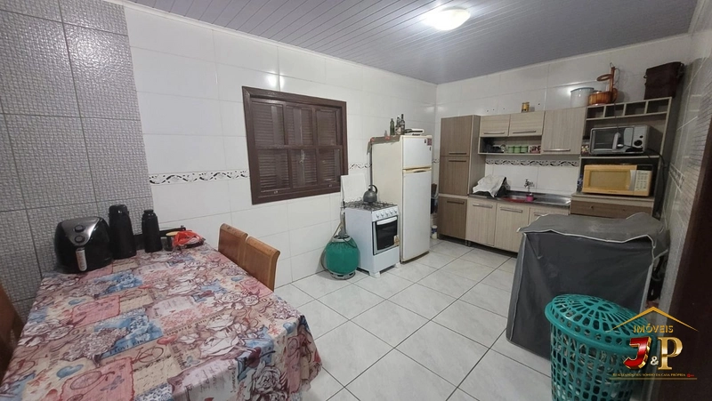 Casa 4 dormitórios no bairro Santa Luzia: 3ª foto da galeria de imagens do imóvel