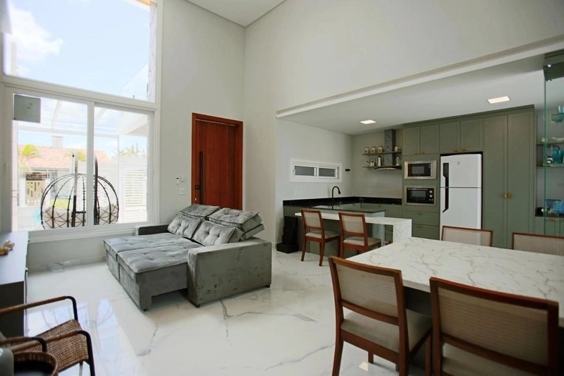 Casa com padrão único com 3 dormitórios e piscina no bairro Zona Nova: 3ª foto da galeria de imagens do imóvel