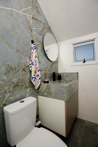 Casa com padrão único com 3 dormitórios e piscina no bairro Zona Nova: 27ª foto da galeria de imagens do imóvel