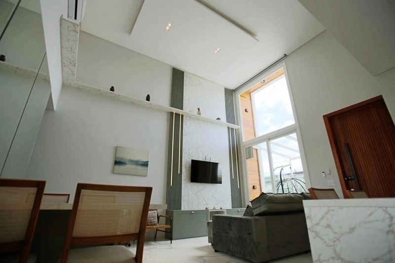 Casa com padrão único com 3 dormitórios e piscina no bairro Zona Nova: 4ª foto da galeria de imagens do imóvel