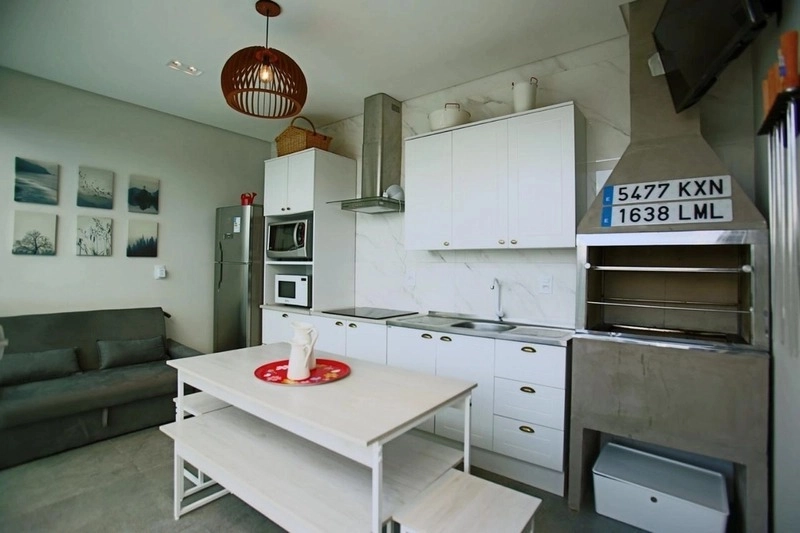 Casa com padrão único com 3 dormitórios e piscina no bairro Zona Nova: 22ª foto da galeria de imagens do imóvel