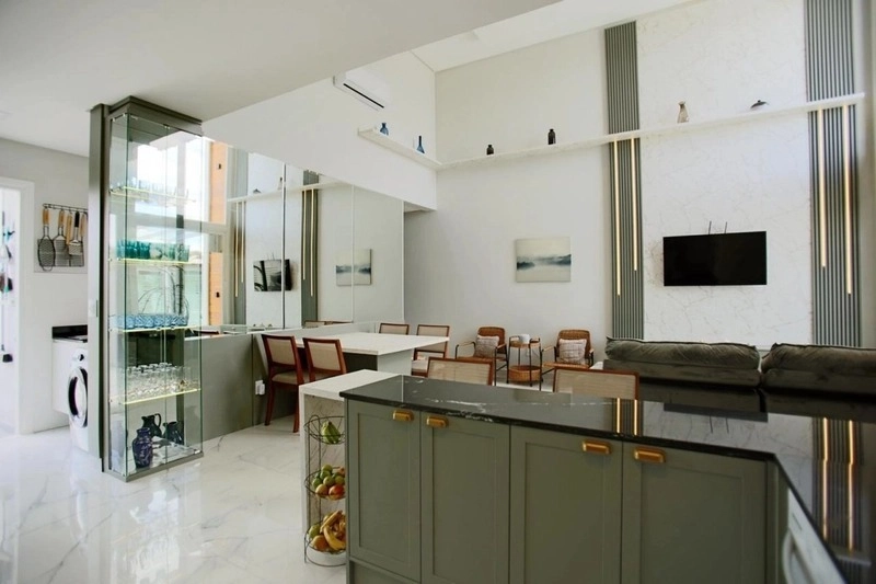 Casa com padrão único com 3 dormitórios e piscina no bairro Zona Nova: 2ª foto da galeria de imagens do imóvel