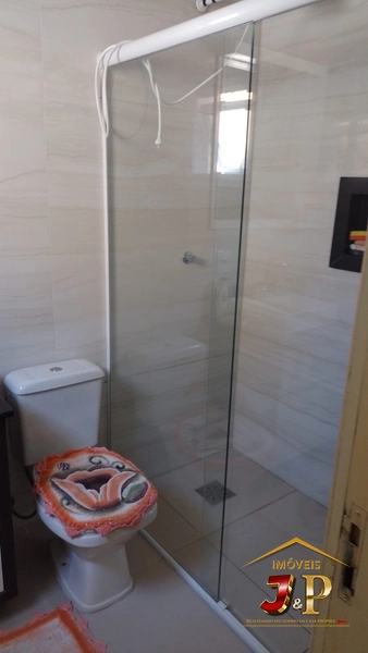 Casa com 2 dormitórios e grande terreno: 4ª foto da galeria de imagens do imóvel