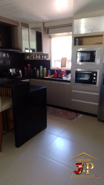 Casa com 2 dormitórios e grande terreno: 11ª foto da galeria de imagens do imóvel