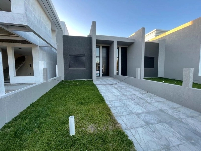 CASA 1 QUADRA DO MAR  EM CAPÃO DA CANOA: 22ª foto da galeria de imagens do imóvel