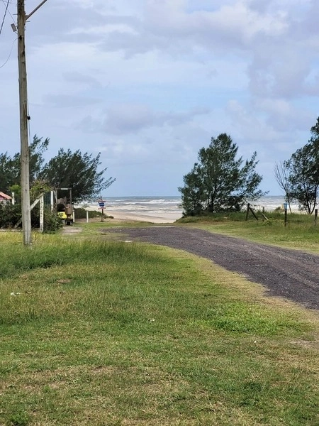 CASA PÉ NA AREIA EM CAPÃO DA CANOA: 2ª foto da galeria de imagens do imóvel