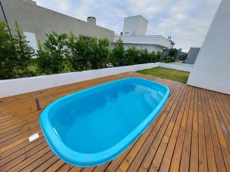 Linda Casa com Piscina no Condomínio Dubai!: 3ª foto da galeria de imagens do imóvel
