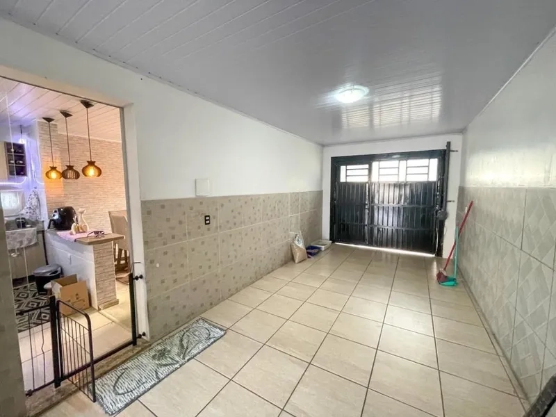Casa a 150m da praia com 3 dormitórios: 5ª foto da galeria de imagens do imóvel