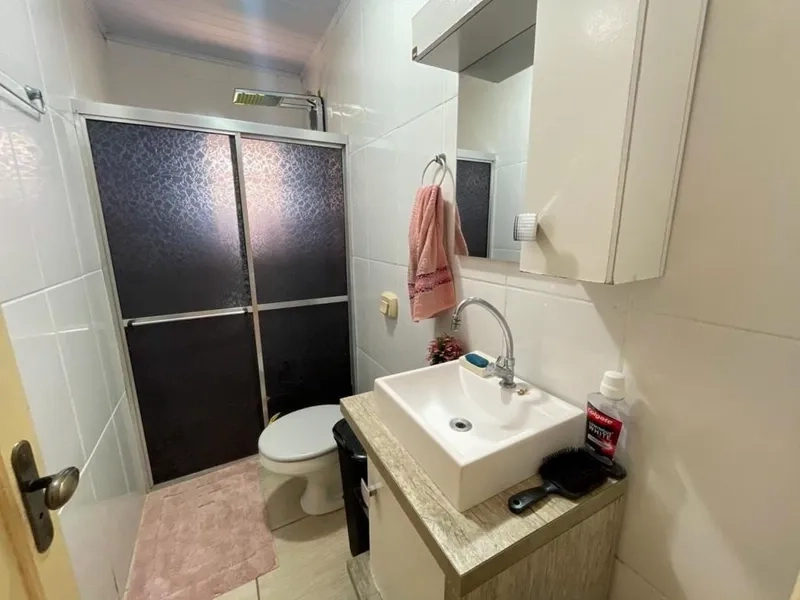 Casa a 150m da praia com 3 dormitórios: 9ª foto da galeria de imagens do imóvel
