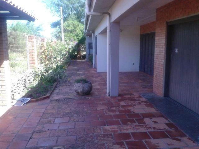 Excelente casa dois terrenos junto ao mar em Capão da Canoa: 1ª foto da galeria de imagens do imóvel