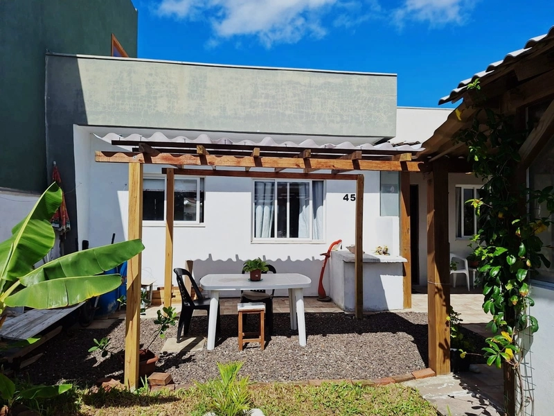 Casa a alguns passos da praia com 2 dormitórios: 11ª foto da galeria de imagens do imóvel