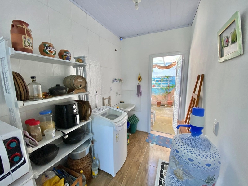 Casa a alguns passos da praia com 2 dormitórios: 2ª foto da galeria de imagens do imóvel